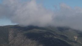 4K aerial stock footage Low clouds over Santa Lucia Range mountains in California Aerial Stock Footage | AX70_257