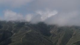 4K aerial stock footage Flyby cloud-capped Santa Lucia Range mountains in California Aerial Stock Footage | AX70_261