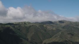 4K aerial stock footage of clouds over mountains in the Santa Lucia Range in California Aerial Stock Footage | AX70_270