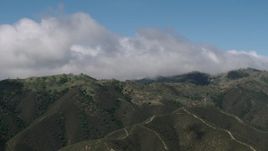 4K aerial stock footage of cloud cover over mountains in the Santa Lucia Range in California Aerial Stock Footage | AX70_271