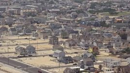 5.1K aerial stock footage of homes near the beach in Seaside Heights, Jersey Shore, New Jersey Aerial Stock Footage | AX71_094