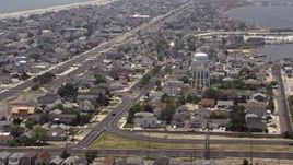 5.1K aerial stock footage of neighborhoods around a water tower in Seaside Heights, Jersey Shore, New Jersey Aerial Stock Footage | AX71_102