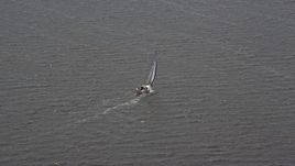 5.1K aerial stock footage of a sailboat in Ocean County, New Jersey Aerial Stock Footage | AX71_144