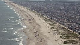5.1K aerial stock footage of a populated beach and beachfront neighborhoods in Ocean City, New Jersey Aerial Stock Footage | AX71_228E