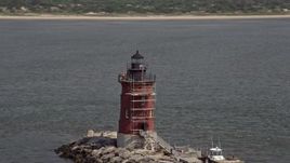 5.1K aerial stock footage flying by the Delaware Breakwater East End Light Aerial Stock Footage | AX72_031