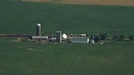 5.1K aerial stock footage of barns and silos by crop fields in Ingleside, Maryland Aerial Stock Footage | AX72_103