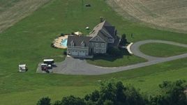 5.1K aerial stock footage of an isolated rural home with a pool in Centreville, Maryland Aerial Stock Footage | AX72_107