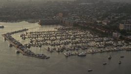 5.1K aerial stock footage of boats docked at Anchorage Marina at sunset in Baltimore, Maryland Aerial Stock Footage | AX73_149