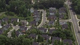 4.8K aerial stock footage of suburban homes by quiet streets in Fairfax, Virginia Aerial Stock Footage | AX74_014
