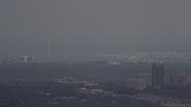 4.8K aerial stock footage of the Washington Monument in thick haze in Washington DC Aerial Stock Footage | AX74_020