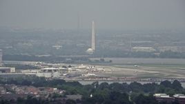 4.8K aerial stock footage of White House, Washington Monument and Jefferson Memorial seen from Reagan National in Washington DC Aerial Stock Footage | AX74_028