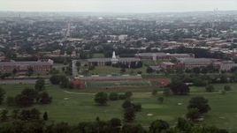 4.8K aerial stock footage of schools and a football field in Washington D.C. Aerial Stock Footage | AX74_049