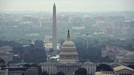 4.8K aerial stock footage of the United States Capitol and Supreme Court, reveal National Mall Monuments in Washington DC Aerial Stock Footage | AX74_054