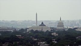 4.8K aerial stock footage of the United States Capitol, Thomas Jefferson and John Adams Buildings, and the Washington Monument in Washington DC Aerial Stock Footage | AX74_056E