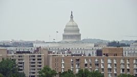 4.8K aerial stock footage of the United States Capitol Dome seen from apartment buildings in Washington DC Aerial Stock Footage | AX74_064E