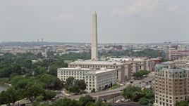 4.8K aerial stock footage of Washington Monument near government office buildings on 14th Street in Washington DC Aerial Stock Footage | AX74_069
