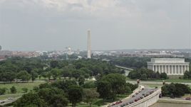 4.8K aerial stock footage of a view across the National Mall at the United States Capitol and the Washington Monument in Washington DC Aerial Stock Footage | AX74_076