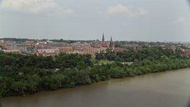 4.8K aerial stock footage of Georgetown University seen from the Potomac River in Washington DC Aerial Stock Footage | AX74_104