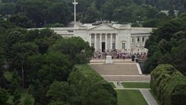 4.8K aerial stock footage of tour groups at the Tomb of the Unknown Soldier at Arlington National Cemetery, Washington DC Aerial Stock Footage | AX74_112