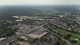 4.8K aerial stock footage approaching shops near homes on Little River Turnpike in Alexandria, Virginia Aerial Stock Footage | AX74_126E