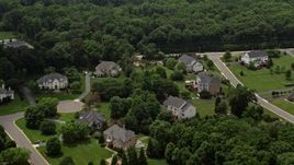 4.8K aerial stock footage flying over beautiful homes in Fairfax Station, Virginia  Aerial Stock Footage | AX74_140
