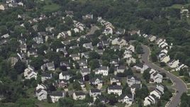 4.8K aerial stock footage approaching and tilting to Suburban Homes in Manassas, Virginia Aerial Stock Footage | AX75_003