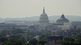 4.8K aerial stock footage of the United States Capitol Dome between the James Madison and Thomas Jefferson Buildings in Washington DC Aerial Stock Footage | AX75_059E