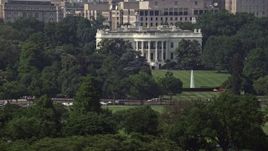 4.8K aerial stock footage the White House and South Lawn, reveal part of Washington Monument in Washington DC Aerial Stock Footage | AX75_077E