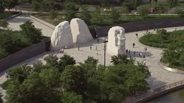 4.8K aerial stock footage of tourists at the Martin Luther King Jr. National Memorial in Washington DC Aerial Stock Footage | AX75_079