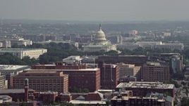 4.8K aerial stock footage of office buildings, the United States Capitol, and the Rayburn House Office Building in Washington DC Aerial Stock Footage | AX75_110