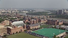 4.8K aerial stock footage of riverfront campus of Georgetown University, and sports fields in Washington DC Aerial Stock Footage | AX75_118E