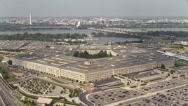 4.8K aerial stock footage orbiting The Pentagon in Washington DC, with bridges over the Potomac in the background Aerial Stock Footage | AX75_128E