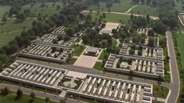 4.8K aerial stock footage approaching a monument at Arlington National Cemetery in Washington DC Aerial Stock Footage | AX75_135