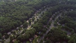 4.8K aerial stock footage tilting to bird's eye view of rows of suburban homes in Fairfax, Virginia Aerial Stock Footage | AX75_161