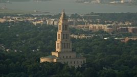 4.8K aerial stock footage of George Washington Masonic National Memorial, Alexandria, Virginia, sunset Aerial Stock Footage | AX76_028