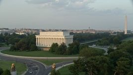 4.8K aerial stock footage Lincoln Memorial, Reflecting Pool, Washington Monument, National Mall, Washington D.C., sunset Aerial Stock Footage | AX76_051