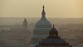 4.8K aerial stock footage of the United States Capitol and Thomas Jefferson Building domes, Washington D.C., sunset Aerial Stock Footage | AX76_090E