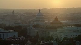 4.8K aerial stock footage of the United States Capitol, Thomas Jefferson and John Adams buildings, Washington D.C., sunset Aerial Stock Footage | AX76_095