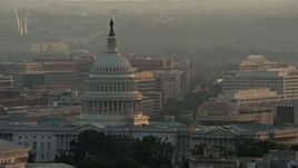 4.8K aerial stock footage of the United States Capitol, US Air Force Memorial in the background, Washington D.C., sunset Aerial Stock Footage | AX76_097