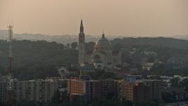4.8K aerial stock footage of Basilica of the National Shrine of the Immaculate Conception, Washington D.C., sunset Aerial Stock Footage | AX76_099