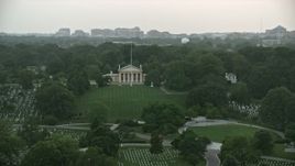 4.8K aerial stock footage of Arlington House and John F. Kennedy Gravesite at Arlington National Cemetery, Virginia, twilight Aerial Stock Footage | AX76_128