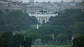 4.8K aerial stock footage of the White House, eclipsed by Washington Monument, Washington, D.C., twilight Aerial Stock Footage | AX76_131E