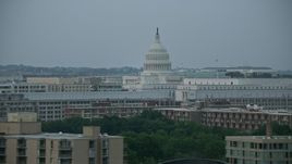 4.8K aerial stock footage of office buildings and the United States Capitol, Washington, D.C., twilight Aerial Stock Footage | AX76_135E