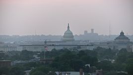 4.8K aerial stock footage of the United States Capitol dome and James Madison Building in Washington, D.C., twilight Aerial Stock Footage | AX76_140E