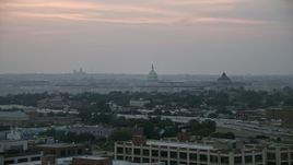 4.8K aerial stock footage of the United States Capitol dome, Library of Congress, and House office buildings, Washington, D.C., twilight Aerial Stock Footage | AX76_143