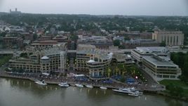 4.8K aerial stock footage of a water and light show at Washington Harbour, Washington, D.C., twilight Aerial Stock Footage | AX76_155