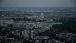 4.8K aerial stock footage of the United States Capitol behind the Russell, Dirksen and Hart Senate Office Buildings, Washington, D.C., twilight Aerial Stock Footage | AX76_165