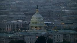 4.8K aerial stock footage of the United States Capitol dome, office buildings in background, Washington, D.C., twilight Aerial Stock Footage | AX76_168E