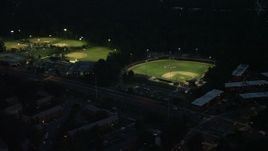 4.8K aerial stock footage of baseball fields in Barcroft Park, Arlington, Virginia, night Aerial Stock Footage | AX76_190