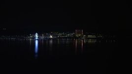 4.8K aerial stock footage approaching Capitol Wheel, Gaylord National Resort and Convention Center, National Harbor, Maryland, night Aerial Stock Footage | AX77_012